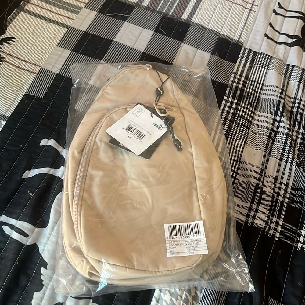 Puma tan sling